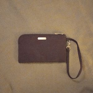 Baggallini clutch with wrist strap purple/pink, purple, blue swirl pattern